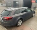Серый Опель Инсигния, объемом двигателя 2 л и пробегом 323 тыс. км за 8500 $, фото 4 на Automoto.ua