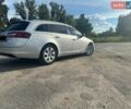 Сірий Опель Інсігнія, об'ємом двигуна 1.96 л та пробігом 313 тис. км за 8999 $, фото 7 на Automoto.ua