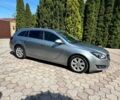 Серый Опель Инсигния, объемом двигателя 2 л и пробегом 194 тыс. км за 10940 $, фото 1 на Automoto.ua