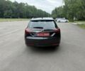 Сірий Опель Інсігнія, об'ємом двигуна 2 л та пробігом 260 тис. км за 9800 $, фото 2 на Automoto.ua