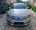 Сірий Опель Інсігнія, об'ємом двигуна 1.96 л та пробігом 300 тис. км за 8800 $, фото 1 на Automoto.ua