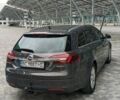 Серый Опель Инсигния, объемом двигателя 2 л и пробегом 285 тыс. км за 11699 $, фото 4 на Automoto.ua