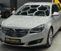 Серый Опель Инсигния, объемом двигателя 2 л и пробегом 253 тыс. км за 11600 $, фото 2 на Automoto.ua