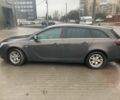 Сірий Опель Інсігнія, об'ємом двигуна 2 л та пробігом 322 тис. км за 9000 $, фото 2 на Automoto.ua