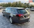 Серый Опель Инсигния, объемом двигателя 2 л и пробегом 295 тыс. км за 8999 $, фото 5 на Automoto.ua