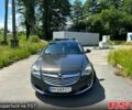 Серый Опель Инсигния, объемом двигателя 2 л и пробегом 296 тыс. км за 9500 $, фото 1 на Automoto.ua