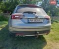 Сірий Опель Інсігнія, об'ємом двигуна 1.96 л та пробігом 247 тис. км за 11500 $, фото 4 на Automoto.ua