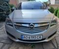 Серый Опель Инсигния, объемом двигателя 2 л и пробегом 300 тыс. км за 8900 $, фото 1 на Automoto.ua
