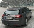 Серый Опель Инсигния, объемом двигателя 2 л и пробегом 285 тыс. км за 11699 $, фото 4 на Automoto.ua