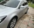 Сірий Опель Інсігнія, об'ємом двигуна 2 л та пробігом 290 тис. км за 10900 $, фото 1 на Automoto.ua