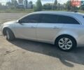 Сірий Опель Інсігнія, об'ємом двигуна 1.96 л та пробігом 313 тис. км за 8999 $, фото 4 на Automoto.ua