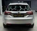 Серый Опель Инсигния, объемом двигателя 2 л и пробегом 253 тыс. км за 11600 $, фото 4 на Automoto.ua
