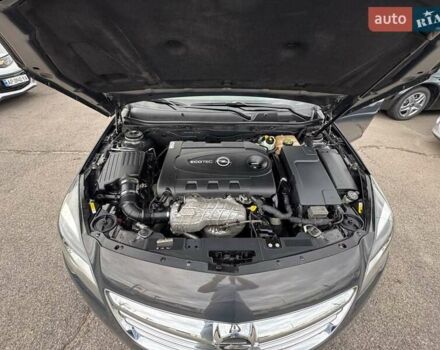 Сірий Опель Інсігнія, об'ємом двигуна 1.96 л та пробігом 245 тис. км за 8499 $, фото 4 на Automoto.ua