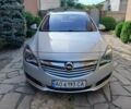 Сірий Опель Інсігнія, об'ємом двигуна 2 л та пробігом 300 тис. км за 8900 $, фото 1 на Automoto.ua