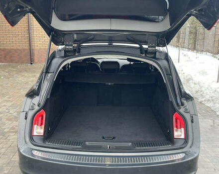 Сірий Опель Інсігнія, об'ємом двигуна 2 л та пробігом 207 тис. км за 9700 $, фото 4 на Automoto.ua