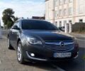 Сірий Опель Інсігнія, об'ємом двигуна 2 л та пробігом 300 тис. км за 9400 $, фото 1 на Automoto.ua