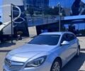 Сірий Опель Інсігнія, об'ємом двигуна 2 л та пробігом 370 тис. км за 8399 $, фото 2 на Automoto.ua