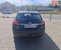 Серый Опель Инсигния, объемом двигателя 1.6 л и пробегом 220 тыс. км за 10300 $, фото 3 на Automoto.ua