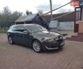 Серый Опель Инсигния, объемом двигателя 1.6 л и пробегом 270 тыс. км за 9400 $, фото 6 на Automoto.ua