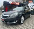 Серый Опель Инсигния, объемом двигателя 2 л и пробегом 258 тыс. км за 11700 $, фото 2 на Automoto.ua