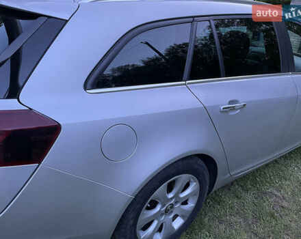 Сірий Опель Інсігнія, об'ємом двигуна 1.96 л та пробігом 212 тис. км за 11499 $, фото 2 на Automoto.ua