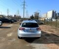Серый Опель Инсигния, объемом двигателя 2 л и пробегом 214 тыс. км за 11200 $, фото 5 на Automoto.ua