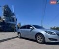 Сірий Опель Інсігнія, об'ємом двигуна 2 л та пробігом 370 тис. км за 8399 $, фото 4 на Automoto.ua
