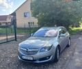 Серый Опель Инсигния, объемом двигателя 2 л и пробегом 223 тыс. км за 11200 $, фото 1 на Automoto.ua