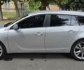 Сірий Опель Інсігнія, об'ємом двигуна 1.96 л та пробігом 249 тис. км за 13100 $, фото 4 на Automoto.ua