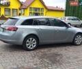 Серый Опель Инсигния, объемом двигателя 2 л и пробегом 259 тыс. км за 9499 $, фото 1 на Automoto.ua