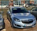 Серый Опель Инсигния, объемом двигателя 2 л и пробегом 214 тыс. км за 11200 $, фото 2 на Automoto.ua