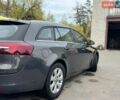 Серый Опель Инсигния, объемом двигателя 1.96 л и пробегом 169 тыс. км за 10000 $, фото 2 на Automoto.ua