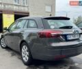 Серый Опель Инсигния, объемом двигателя 1.96 л и пробегом 169 тыс. км за 10000 $, фото 6 на Automoto.ua