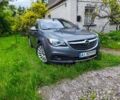 Сірий Опель Інсігнія, об'ємом двигуна 2 л та пробігом 280 тис. км за 11936 $, фото 1 на Automoto.ua