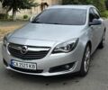 Сірий Опель Інсігнія, об'ємом двигуна 1.96 л та пробігом 249 тис. км за 13100 $, фото 2 на Automoto.ua