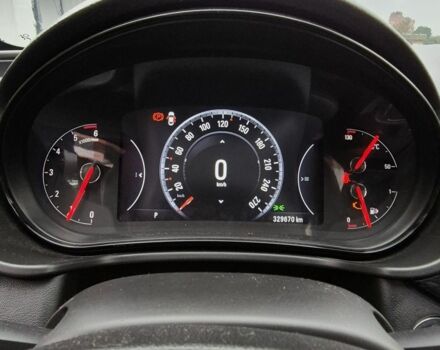 Серый Опель Инсигния, объемом двигателя 2 л и пробегом 329 тыс. км за 9000 $, фото 5 на Automoto.ua