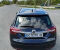 Серый Опель Инсигния, объемом двигателя 2 л и пробегом 243 тыс. км за 11000 $, фото 2 на Automoto.ua