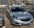 Серый Опель Инсигния, объемом двигателя 2 л и пробегом 215 тыс. км за 11200 $, фото 1 на Automoto.ua