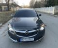 Серый Опель Инсигния, объемом двигателя 1.6 л и пробегом 240 тыс. км за 8900 $, фото 1 на Automoto.ua