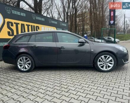 Серый Опель Инсигния, объемом двигателя 2 л и пробегом 258 тыс. км за 11700 $, фото 4 на Automoto.ua