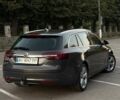 Серый Опель Инсигния, объемом двигателя 2 л и пробегом 273 тыс. км за 12700 $, фото 6 на Automoto.ua