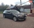 Серый Опель Инсигния, объемом двигателя 1.6 л и пробегом 234 тыс. км за 10800 $, фото 6 на Automoto.ua