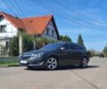Серый Опель Инсигния, объемом двигателя 2 л и пробегом 269 тыс. км за 11600 $, фото 5 на Automoto.ua