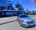 Сірий Опель Інсігнія, об'ємом двигуна 2 л та пробігом 370 тис. км за 8399 $, фото 1 на Automoto.ua