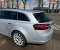 Сірий Опель Інсігнія, об'ємом двигуна 2 л та пробігом 340 тис. км за 12000 $, фото 7 на Automoto.ua