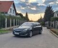 Серый Опель Инсигния, объемом двигателя 2 л и пробегом 269 тыс. км за 11600 $, фото 2 на Automoto.ua