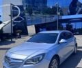 Сірий Опель Інсігнія, об'ємом двигуна 2 л та пробігом 370 тис. км за 8699 $, фото 2 на Automoto.ua