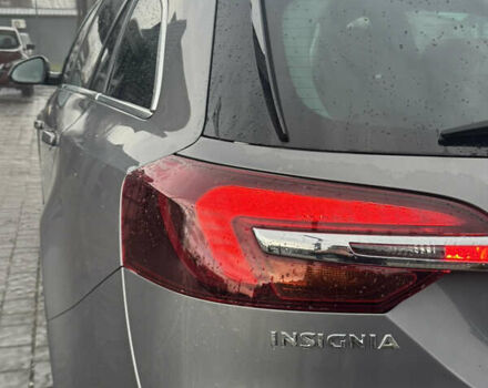 Сірий Опель Інсігнія, об'ємом двигуна 1.6 л та пробігом 258 тис. км за 10899 $, фото 4 на Automoto.ua