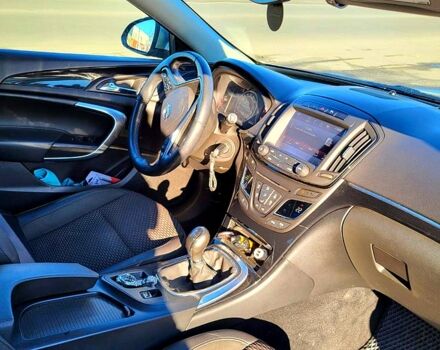 Серый Опель Инсигния, объемом двигателя 2 л и пробегом 294 тыс. км за 10500 $, фото 4 на Automoto.ua