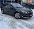 Серый Опель Инсигния, объемом двигателя 2 л и пробегом 220 тыс. км за 12950 $, фото 1 на Automoto.ua